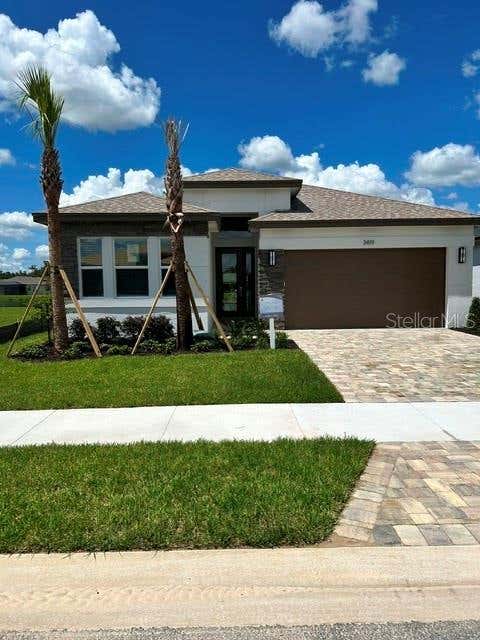 Photo of 3419 Malta Avenue, Wesley Chapel, FL 33543 (MLS # TB8532498)