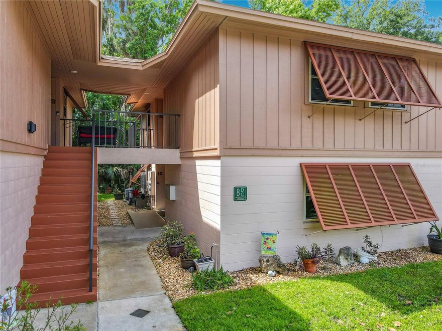 Some rooms have been virtually staged. Immaculate ground-floor END unit offering peaceful wooded views and low-maintenance living. This beautifully updated home features new luxury vinyl flooring throughout, renovated bathrooms, and major upgrades including NEW WINDOWS and SLIDING GLASS DOORS. A front entry ramp provides added convenience and accessibility.
Enjoy the Florida lifestyle with nearby access to Lake Monroe and Green Springs Park, along with community amenities including a pool and tennis courts. Immediately adjacent to the community is the East Central Regional Rail Trail, a scenic 52-mile paved trail perfect for walking, jogging, skating, and cycling. Conveniently located near Interstate 4 for easy commuting to Orlando, area beaches, and Orlando and Sanford International Airports. Schedule your private showing today.