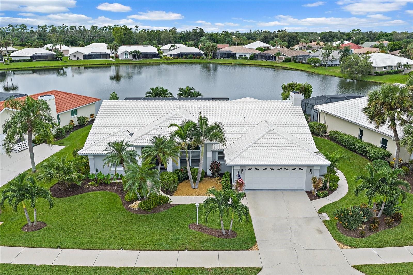 Welcome to the beautiful and well-established community of Waterford, where you can live the Florida lifestyle in the heart of Venice! This truly remarkable home offers STUNNING WATER VIEWS from the moment you enter and continue to nearly every room! You'll feel like you've just stepped into a brand-new home, only better! This well-appointed home is COMPLETELY UPDATED with quality finishes and skillful workmanship! The split-bedroom floor plan offers 3 bedrooms plus a den (with a Murphy bed), 2 bathrooms and 2,365 sq. ft. of functional living space with high ceilings. The gourmet kitchen is open to the family/living room and features a huge island, new cabinetry, quartz countertops, high-end appliances, including a Monogram 36 inch gas range, a large pocketing window and sliding glass doors. The living room features a beautiful gas fireplace and pops with custom wood work. The entire home shows like a model with luxurious trim work throughout the main living areas. New LVT flooring flows consistently throughout the home, with the exception of the primary bedroom. All new ceiling fans and light fixtures. The primary bedroom is spacious and offers gorgeous new tile flooring, a sitting area, 2 walk-in closets, and sliding glass doors providing access to the lanai and pool. The guest bathroom has pool access. Both guest bedrooms feature walk-in closets. Additional updates include a new ultimate view PANORAMIC SCREEN ENCLOSURE (2025), PAVER POOL DECK & POOL RESURFACE (2025), POOL HEATER (2022), 2-zone HVAC system (2019). The home features two water heaters for maximum efficiency (1 gas and 1 electric). The roof was replaced in 2010. Sliding glass doors from the dining room, kitchen, primary bedroom, and guest side hallway provides plenty of natural light, beautiful lake views and lead out to your outdoor living space with a large covered lanai, newly remodeled pool, new paver patio and new screen enclosure. Additional features include an outside shower and beautiful landscape. No CDD fee here! The low HOA fee of $2,165 annually provides you with access to amazing amenities including heated pool, lit Har-Tru tennis courts, pickleball, hot tub, social room with kitchen, dance floor and fitness center. The Waterford Golf course offers 27 holes of golf, driving range, putting green and a restaurant. Great location with easy access to Sarasota via I75 or US 41, pristine beaches, excellent schools, parks, shopping, dining, medical, historic downtown Venice, the new Sarasota Memorial Hospital and so much more!