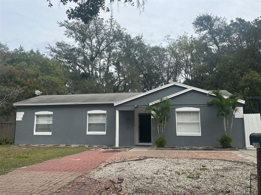 Charming 2 bedroom with 2 full baths.  Large background area for barbeques and entertaining guests.
 Completely fenced.  No carpet in home lots of living space.
New water heater and a/c unit.  Don't miss this one!