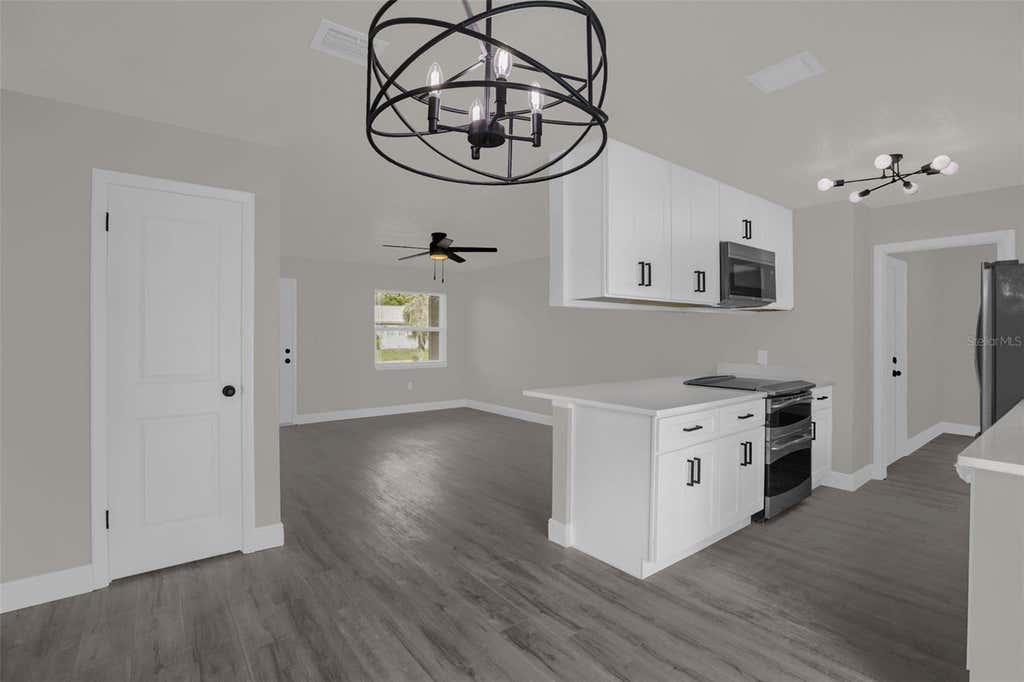 Photo of 1223 S Oxalis Avenue, Orlando, FL 32807 (MLS # O6414310)