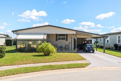 Photo of 5438 Seville Drive, Zephyrhills, FL 33541 (MLS # O6452170)