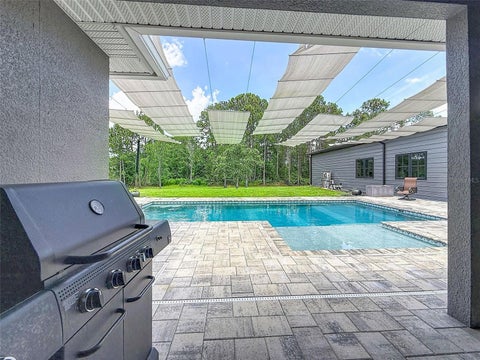 Tiny photo for 30115 W Thyme Ave, Eustis, FL 32736 (MLS # TB8517958)