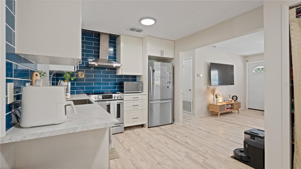 Photo of 1124 W Desoto Street, Clermont, FL 34711 (MLS # O6441376)