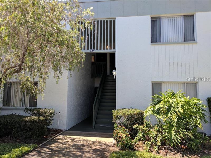 Cozy lake-view 1 Bedroom 1 bath condo located less than 6 miles from Clearwater Beach. Second floor unit. This unit features one spacious bedroom with two closets, laminate floors, open floor plan, living/dining combo. The kitchen features wood cabinetry, large refrigerator, dishwasher and lots of countertops. The kitchen overlooks the living room. Lots of storage space inside. The covered balcony offers additional storage closet and overlooks the lake. This property is close to shopping, restaurants, beaches. HOA allows rentals. Laundry facilities onsite.