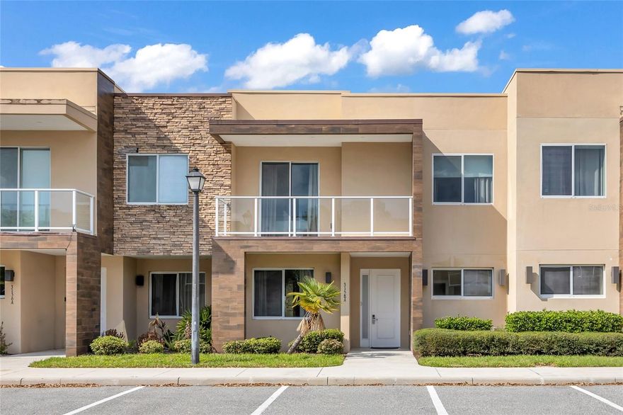 Welcome to 3158 Brasilia Ave, a stunning fully furnished luxury townhome located in the highly desirable Magic Village Resort, just minutes from Walt Disney World and Orlando’s premier attractions. This beautifully designed 4-bedroom, 4.5-bathroom residence features a contemporary open-concept layout with high ceilings, abundant natural light, and upscale finishes throughout. The home offers two spacious primary suites, including one conveniently located on the first floor, making it ideal for vacation guests or multi-generational use. The gourmet kitchen is equipped with granite countertops, stainless steel appliances, and custom wood cabinetry, seamlessly flowing into
the living and dining areas for effortless entertaining. Step outside to a private patio complete with a built-in grill and sink, overlooking a peaceful lake view, while a second-floor balcony provides an additional space to relax and unwind. Located within a premier short-term rental community, this property offers excellent income potential with strong and consistent demand driven by its close proximity to Disney, major theme parks, shopping, dining, and entertainment. Residents and guests of Magic Village enjoy access to resort-style amenities including a community pool, hot tub, on-site restaurant, and a fully equipped fitness center, enhancing both guest experience and rental appeal. The home is being sold fully furnished with high-end décor, flat-screen televisions, hotel-quality bedding, and all essential housewares, making it completely turnkey for immediate personal use or rental income. Whether you are seeking a vacation home, investment property, or both, this residence presents a rare opportunity to own a luxury property in one of Central Florida’s most sought-after resort communities.