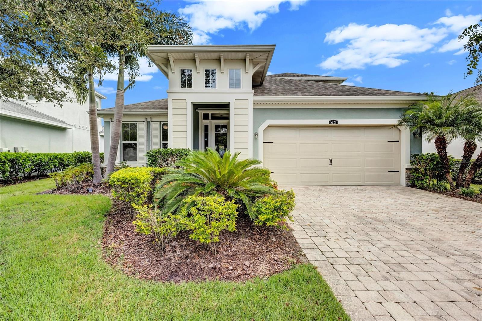 PRICED TO SELL. MOTIVATED SELLER. Amazing finishes in this upgraded Everglade model in Harmony at Lakewood Ranch. This beautiful 4 Bedroom, 3 Bath two story home has over 2,400 square feet of living space. Recently painted, with all carpeting replaced, the house sits on a cul-de-sac next to a large pond. You will immediately notice the coastal construction style of this amazing home. Upon entering the front door, you will be struck with the look of the beautiful floors leading through the open concept main floorplan to a cook’s kitchen with plenty of counter space, pantry and a huge center island with breakfast bar. The extra-large Family Room/Dining area opens via sliding doors to the paver patio. The primary bedroom, with ensuite bathroom, is located at the back of the home. This bedroom is filled with natural light and has sliders that lead to the outdoor patio. Two other guest bedrooms on the first floor share an additional bath. Heading upstairs you will find a fourth bedroom that acts as a second master with adjoining third full bath and a huge bonus room. There is also an extra-large closet/storage area. A separate office downstairs, conveniently located near the front door, will provide separation from daily living. For your convenience, the home has a first floor laundry room. There is also an extra-large two car garage with paver driveway. With beautiful clubhouse facilities, playgrounds, lakes, and a community pool, this neighborhood has all there is needed for the growing family. Located in the heart of Lakewood Ranch. Convenient to all the surrounding local restaurants, shops, bars, and bistros. Just a short drive to downtown Lakewood Ranch, a 5-minute drive to I75, and close to all the world-famous beaches, this is the perfect location for you. Situated in a district with great schools and so much more, there are so many reasons to preview this today and see why this is house and community are one of the best values in Lakewood Ranch!