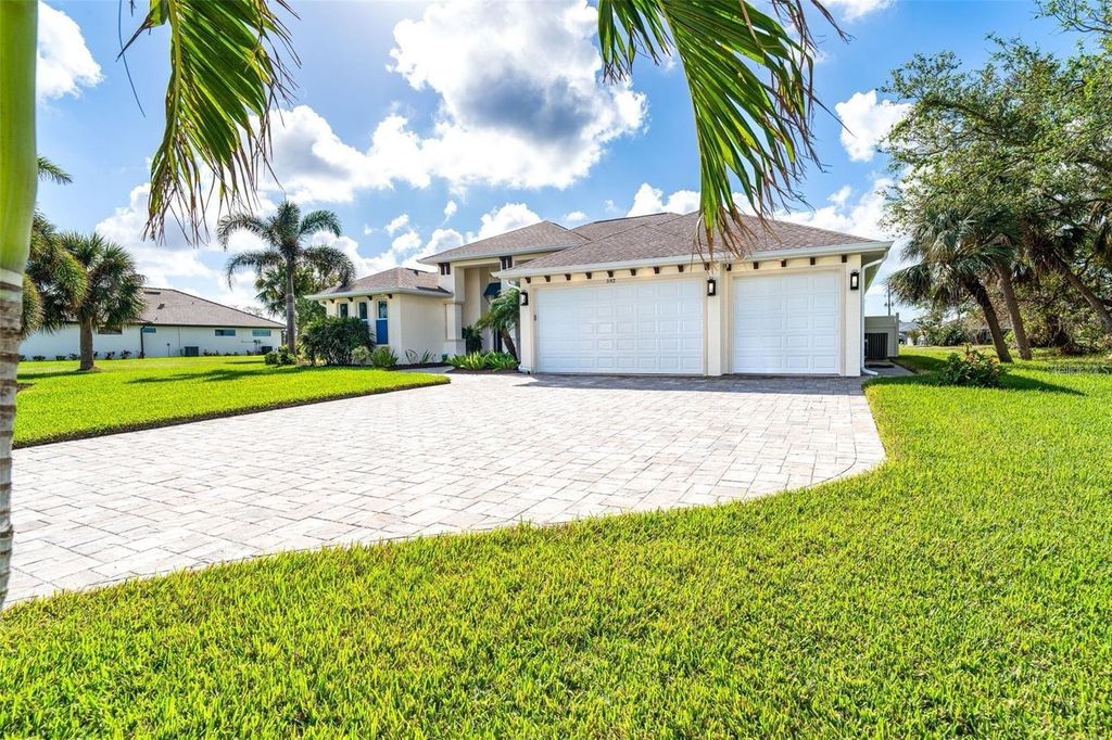 Photo of 592 Boundary Boulevard, Rotonda West, FL 33947 (MLS # D6144563)