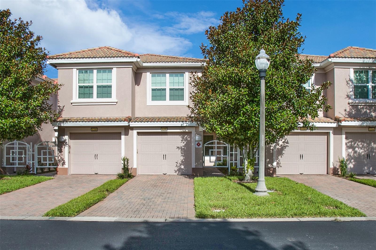 This updated, furnished, ground floor, 2 bedroom/2 bathroom condo, is in the peaceful Bella Trae Community. The property features laminate flooring, granite countertops, and upgraded cabinets. The kitchen has stainless steel appliances, and a breakfast nook for you to sit an relax in. There are ceiling fans throughout, including the office (can be used as a bedroom) and the enclosed lanai. This property comes with a full sized washer and dryer and is partially furnished. There is an attached one-car garage and driveway for easy parking. The Bella Trae Community has amenities galore: heated pool, fitness center, game room, putting green, media center and a full time activities director. You're only minutes away from shopping, dining, and entertainment. Rent includes basic cable, internet and pest control. Access cards to the Clubhouse are currently $10 each for anyone 18 years or older and vehicle stickers are $15 each. Two vehicles maximum, no oversized or corporate vehicles allowed. Interested parties will need to apply through the HOA as well, as they have a strict 35-day approval process. This property is tenant occupied until the end of August.