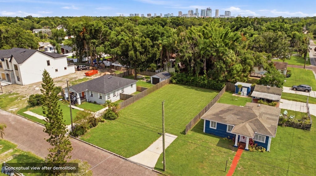 Photo of 818 W Kentucky Avenue, Tampa, FL 33603 (MLS # TB8558272)