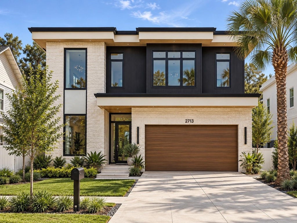 Photo of 818 W Kentucky Avenue, Tampa, FL 33603 (MLS # TB8558272)