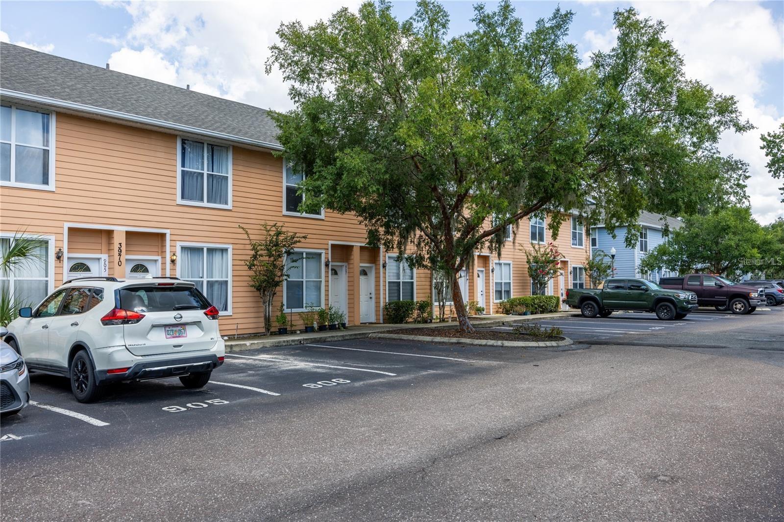 Available September 15th! 2 bed 2.5 bath townhome-style condo in Kensington North. Great location on SW 20th Ave near UF, Shands, Bulter Plaza, Celebration Point, and shopping. The first floor features a spacious living room flowing into the dining room. The kitchen has updated cabinets and a breakfast bar. The first floor also has a half bath, a utility closet with a washer and dryer, and lots of storage space. Wood plank flooring is throughout the first floor, and carpet floors are on the staircase and upstairs bedrooms. Upstairs are two spacious bedrooms with large closets and ensuite bathrooms with updated vanities. Community amenities include a pool, fitness center, clubhouse, and high-speed internet. Direct bus routes on SW 20th Ave.