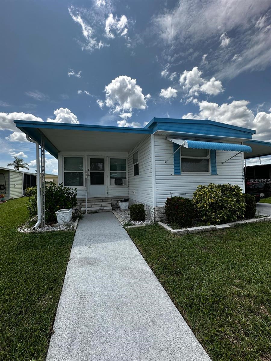 Welcome to 3245 Lanark Dr in the sought-after 55+ community of Tanglewood Mobile Village in Holiday, Florida! This beautifully maintained 2-bedroom, 2-bath home offers a bright, open layout with a spacious Florida room—perfect for relaxing or entertaining. Enjoy updated flooring, a well-equipped kitchen with ample cabinetry, and a cozy dining area. The home also features a screened-in patio, utility shed with washer/dryer, and a covered carport for convenience. Tanglewood Mobile Village is a quiet, pet-friendly, golf cart community with low HOA fees and a vibrant social scene. Located minutes from shopping, beaches, dining, and medical facilities.
Don't miss your chance to enjoy affordable Florida living in a peaceful, friendly neighborhood!