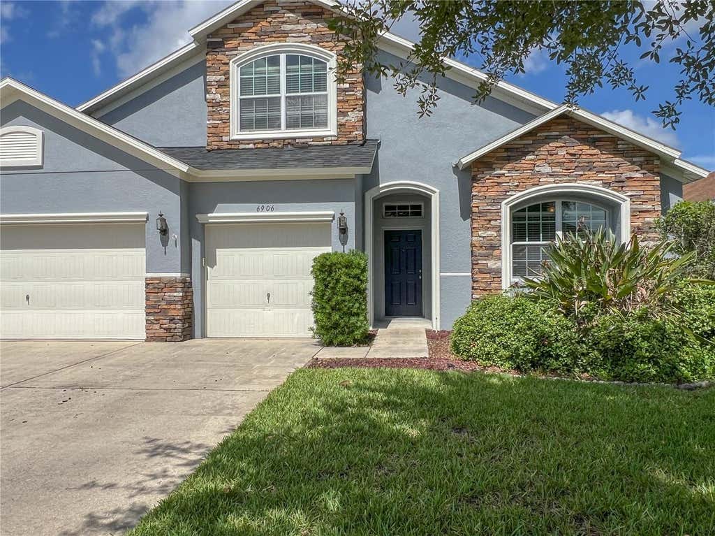 Photo of 6906 Boulder Run Loop, Wesley Chapel, FL 33545 (MLS # TB8512148)