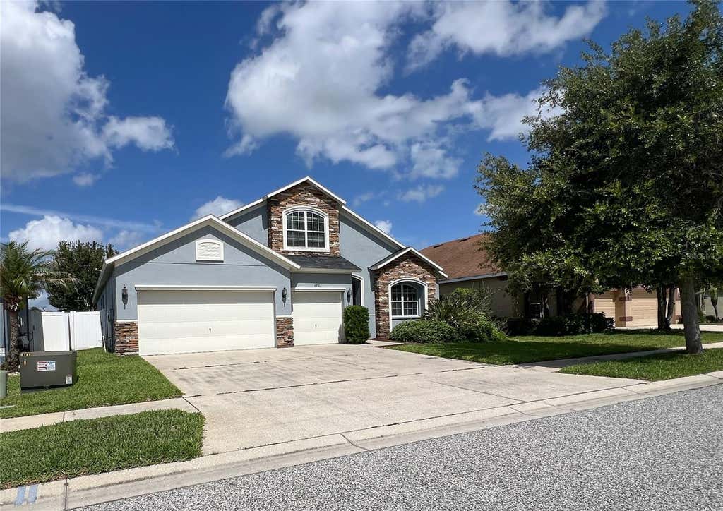 Photo of 6906 Boulder Run Loop, Wesley Chapel, FL 33545 (MLS # TB8512148)