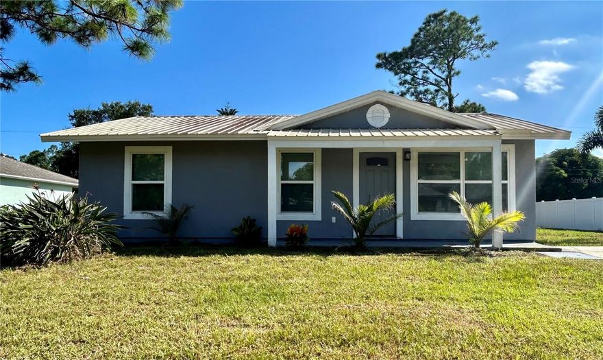OFFERING A $5000.00 CLOSING COST CREDIT AS AN INCENTIVE TO ANY BUYER THAT BRINGS AN ACCEPTABLE OFFER AND CAN AND WILL CLOSE ON OR BEFORE NOVEMBER 30, 2023.   Great opportunity to own this recently remodeled home in the heart of Palm Bay in close proximity to I95, major roadways, shopping, schools and parks.  You will not be disappointed when you pull up to this well-appointed home.  Interior features laminate floors throughout.  Very bright great room leads to a kitchen with an island, granite countertops and stainless-steel appliances.  There are three additional bedrooms and a large, shared bathroom.  Ceiling fans, newer interior paint and double pane windows add to the appeal.  There is a laundry closet with washer and dryer hookups. Metal roof adds extra curb appeal and is ideal for coastal living. The large lot features a paved driveway. Backyard is cleared and level and features a large 10 X 21 shed ideal to store an ATV or use as a workshop.  Make this home yours today.  Call for a private showing.  This home is priced to sell.