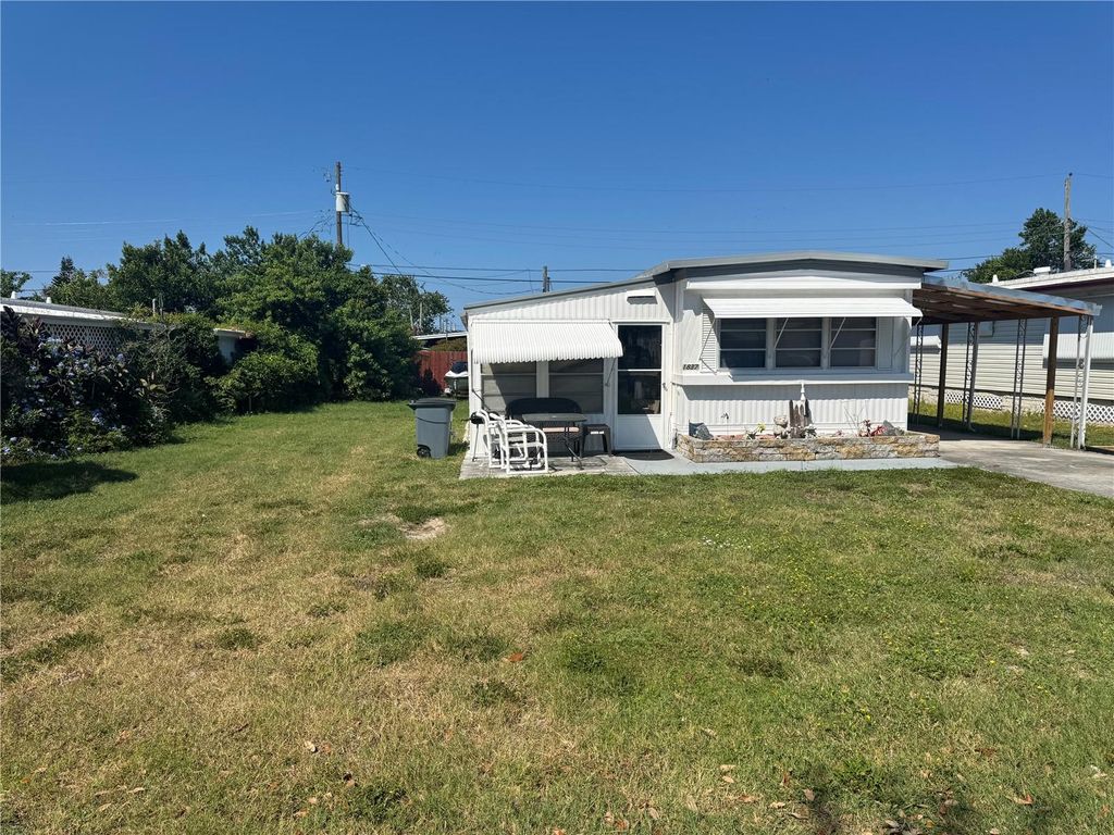 Photo of 1837 Lullaby Drive, Holiday, FL 34691 (MLS # TB8429878)