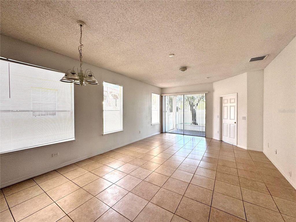 Photo of 14460 Huntcliff Park Way, Orlando, FL 32824 (MLS # O6399833)