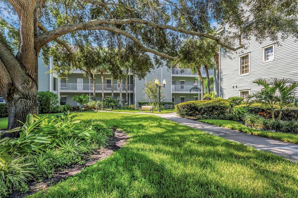 Photo of 330 Promenade Drive #103, Dunedin, FL 34698 (MLS # TB8421203)