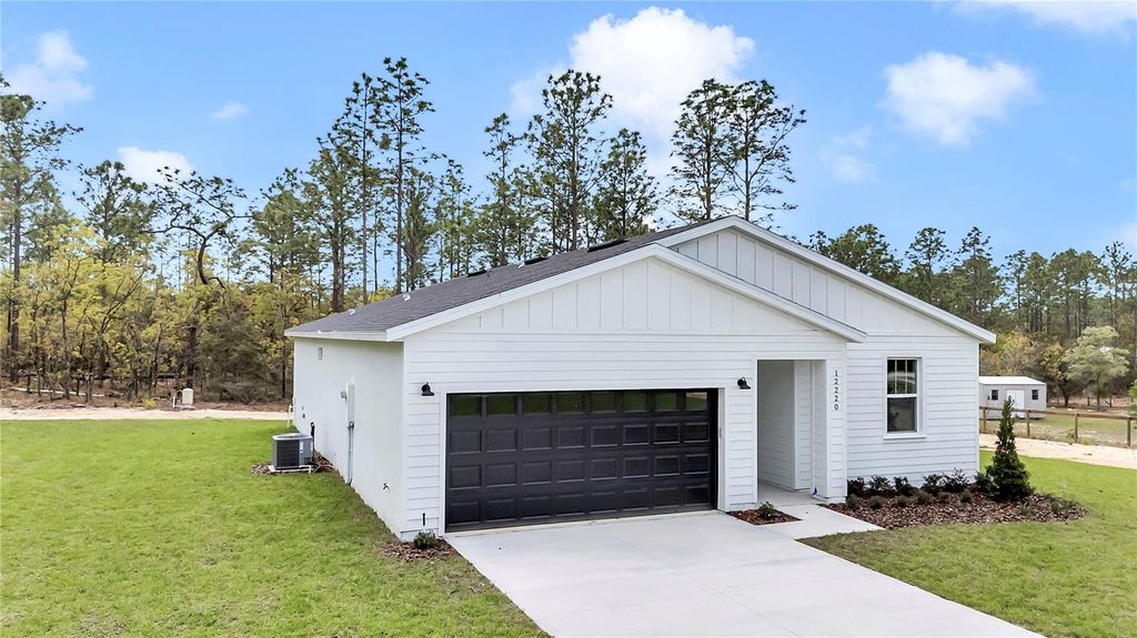 Photo of 12220 SW 76th Lane, Dunnellon, FL 34432 (MLS # O6263176)