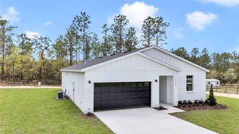 Photo of 12220 SW 76th Lane, Dunnellon, FL 34432 (MLS # O6263176)