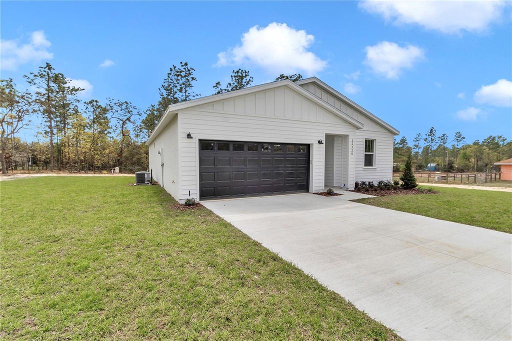 Photo of 12220 SW 76th Lane, Dunnellon, FL 34432 (MLS # O6263176)
