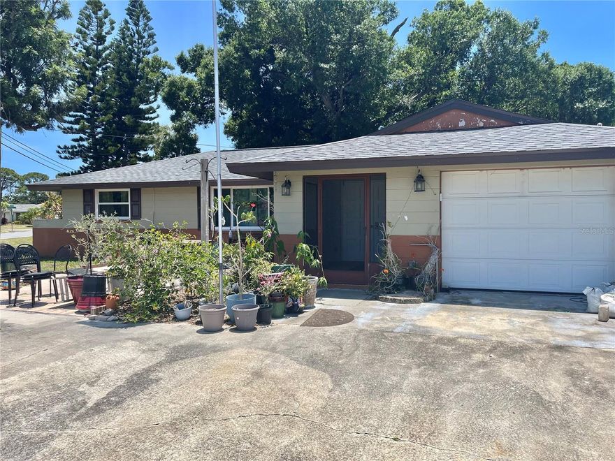 South Venice opportunity!! This home is full of potential with many major repairs and replacements done for you. Newer Impact windows! Roof only 2 years old! Newer AC! Remodeled kitchen! House has also been repiped! Enclosed sunroom can be used as an office, den or even a guest bedroom! The primary bedroom suite has a walk-in shower. The guest bedroom also has a private bathroom. Some cosmetic love is needed, but this home has great bones, an attached garage, a lovely garden and outdoor patio, and a circular driveway. There is also a shed in the back yard. The location is convenient to shopping, dining, entertainment and historic downtown Venice. Membership in South Venice Civic Association offers access to a boat  ramp and ferry to your own private beach! Perfect for kayaking and fishing. No HOA or CDD fees!!!
