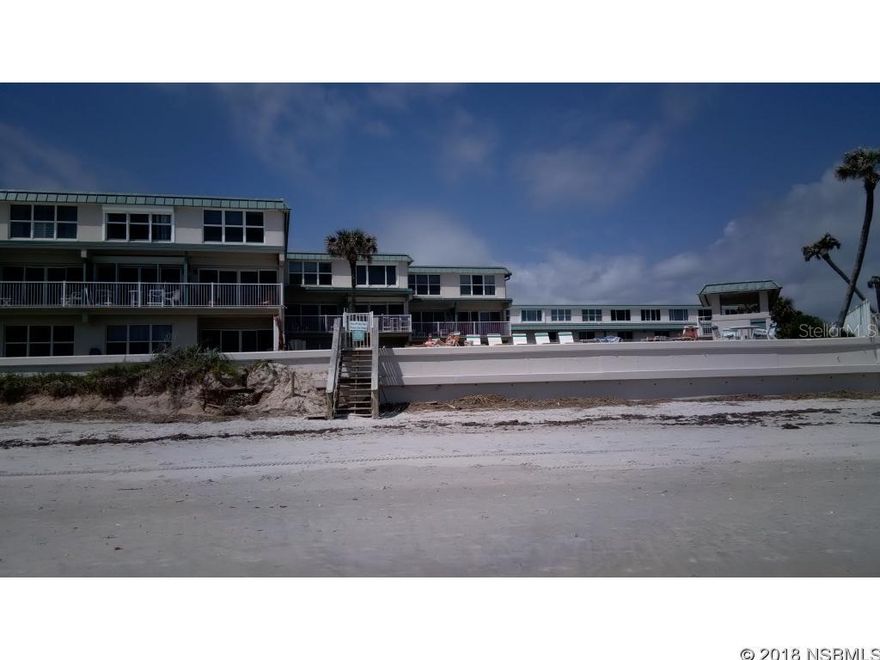This beautiful, 2-story townhouse condo is located on the no-drive portion of much desired New Smyrna Beach! Enjoy ocean views from this updated condo which includes a tiled main living area on the first floor. The kitchen is open and bright with custom lighting, a beautiful color of a soft coco stain on the wood cabinets, with glass doors on the cabinets above the breakfast bar counter, Silestone solid surface counter tops and stainless steel appliances. There is an updated full bathroom on the main level and there are 2 bedrooms and an updated full bathroom upstairs with jets in the tub! The master bedroom has beautiful ocean, beach and pool views. There is a 3-night minimum for rentals, pets are allowed, water and basic cable is included in the monthly maintenance fee, there is a rec room with a pool table and cable tv, a laundry room with incoming and outgoing mail, tennis and shuffleboard court, a gazebo, shower and restroom at the direct oceanfront pool. The seawall has been recently renovated, newer pool pavers and pool edge coping and recent concrete renovations. There is a full time on-site manager. The complex is well maintained. Short term boat and non-commercial trailer parking is allowed on non-peak days. This is mid-rise complex with easy access to the BEACH! The Canaveral Seashore is approximately 4 miles south and many shops and restaurants are very close-by. ;LocationDescription: Condo ;Water: City