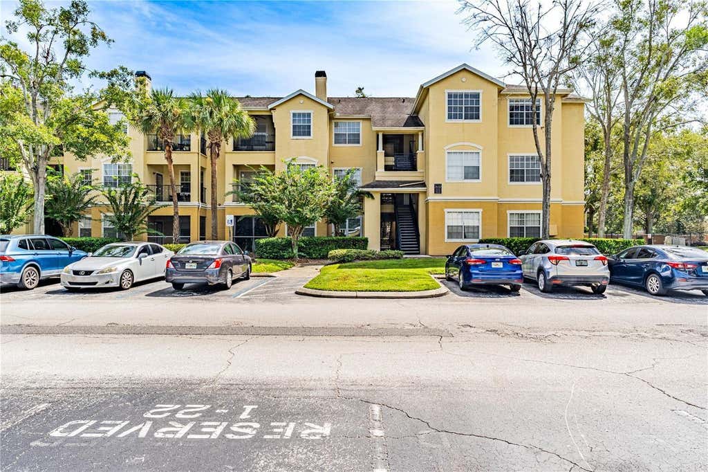 Photo of 2632 Robert Trent Jones Drive #136, Orlando, FL 32835 (MLS # O6425851)