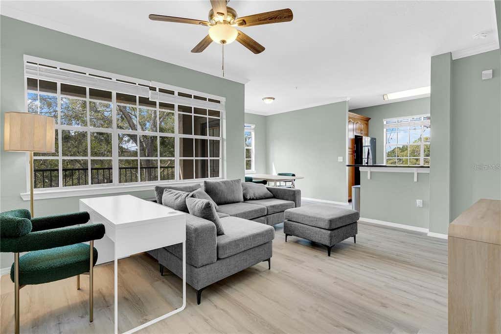 Photo of 2632 Robert Trent Jones Drive #136, Orlando, FL 32835 (MLS # O6425851)