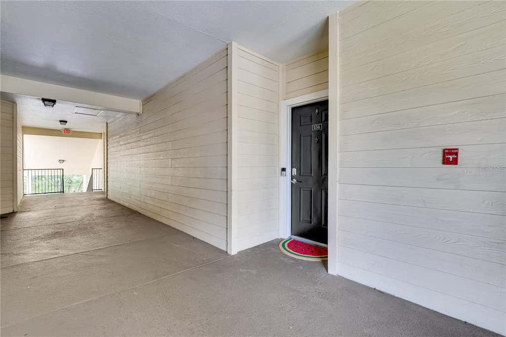 Photo of 2632 Robert Trent Jones Drive #136, Orlando, FL 32835 (MLS # O6425851)