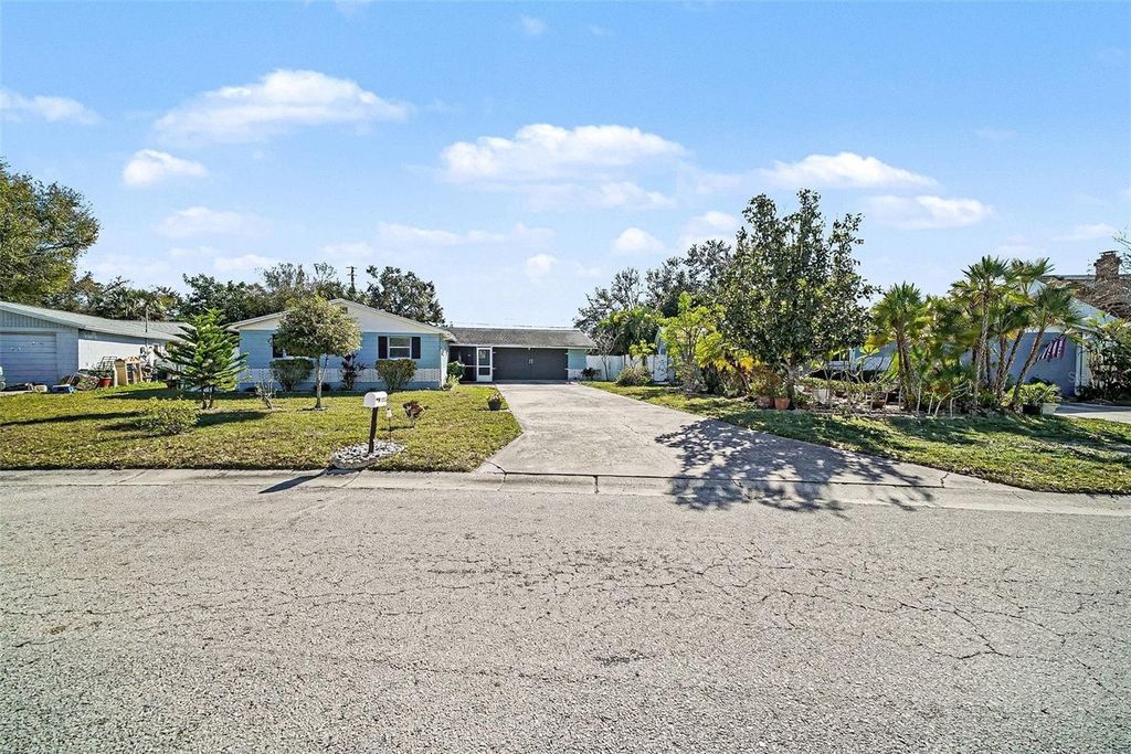 Photo of 9038 Fairweather Drive, Largo, FL 33773 (MLS # TB8466268)