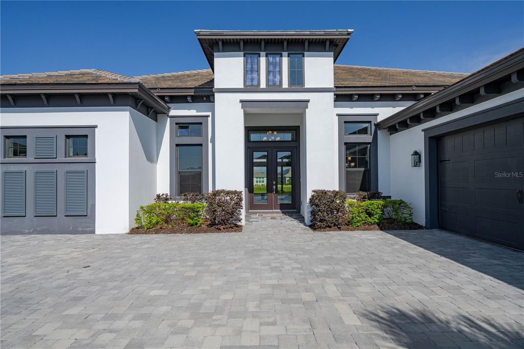 Photo of 4866 Freccia Loop, Wesley Chapel, FL 33543 (MLS # TB8505403)