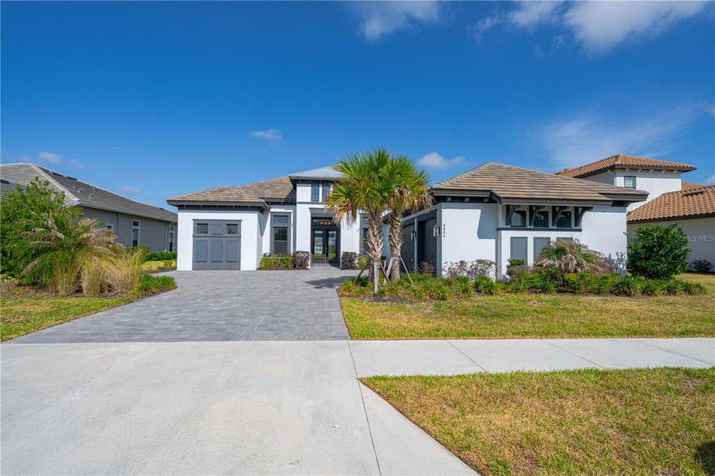 Photo of 4866 Freccia Loop, Wesley Chapel, FL 33543 (MLS # TB8505403)