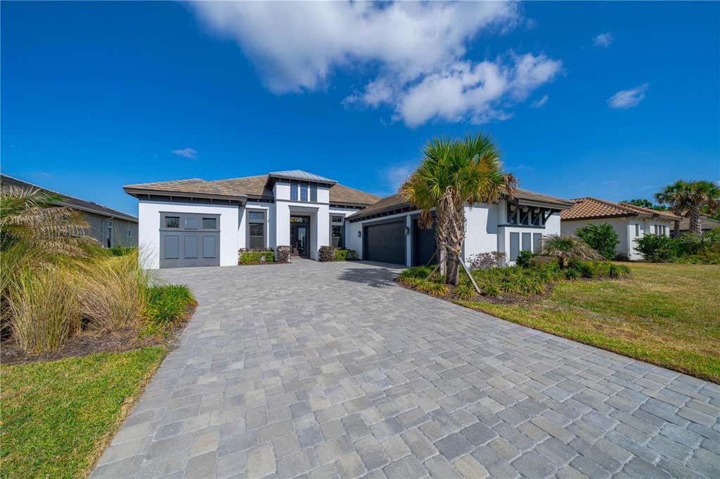 Photo of 4866 Freccia Loop, Wesley Chapel, FL 33543 (MLS # TB8505403)