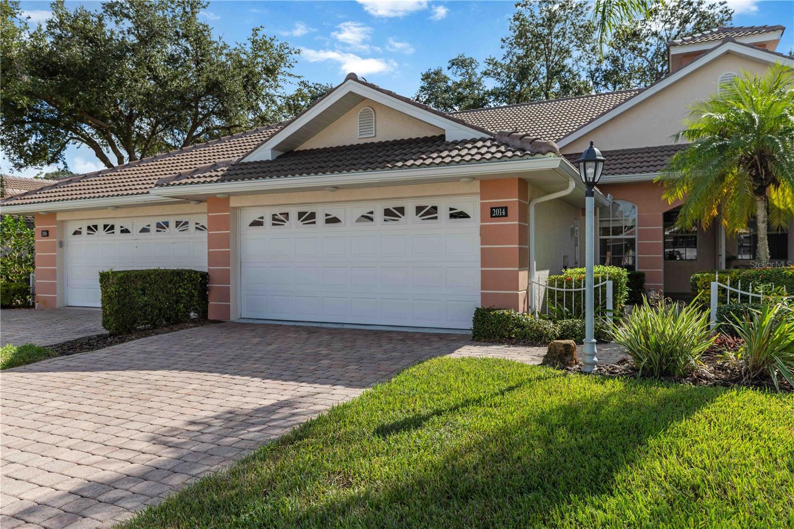 Discover Your Dream Florida Lifestyle with this Partially Furnished Villa!
Experience the perfect blend of comfort, convenience, and effortless living in this beautifully cared-for 2-bedroom + den, 2-bath villa nestled in the sought-after Bobcat Community. A brand-new roof (2024) provides peace of mind, while the villa’s prime location places you just steps from a private pool reserved exclusively for villa owners, with a second pool at the main club house a quick walk or golf cart ride away.
This partially furnished home boasts a freshly painted, light and neutral interior, offering 1,468 sq. ft. of thoughtfully designed living space that is truly move-in ready. This Villa is priced to sell and this opportunity won’t last long!
The open floor plan features soaring ceilings and triple sliding patio doors, filling the home with natural light. While officially listed as a 2-bedroom, the versatile Den can easily serve as a 3rd bedroom, office, sitting room, or overflow guest space.
The split layout provides privacy for guests, with the guest bedroom including walk in closet and bath at the front of the home, while the spacious Primary Suite is tucked away at the rear. Enter through French doors to find a walk-in closet, ensuite bathroom, dual sinks, Roman shower, and private water closet.
The kitchen is equipped with white colored cabinets, modern appliances, a pantry, breakfast bar, island with storage, and built-in desk. A convenient laundry area with washer and dryer is also included. Step out to the screened lanai overlooking peaceful green space—an inviting spot for morning coffee, happy hour or evening of relaxation.
Additional highlights include a 2-car garage, freshly painted interior, professionally cleaned carpets, a brand-new tile roof (2024), Pergo flooring installed approx. 4 years ago in kitchen, foyer, Bath 2 and low-maintenance living in a pet-friendly & golf cart community. HOA will repaint the villas in tasteful, contemporary colors starting January 2026 to complement the new tile roof.
Enjoy the rich amenities: two pools, clubhouse with fitness center, tennis and pickleball courts, plus an active social calendar. A quick golf cart ride or 15-minute walk takes you to the main Bobcat Clubhouse. Conveniently located just 5 miles from I-75 and minutes from shopping, dining, and entertainment.
It is now your turn to start living the Florida lifestyle you’ve been dreaming of.