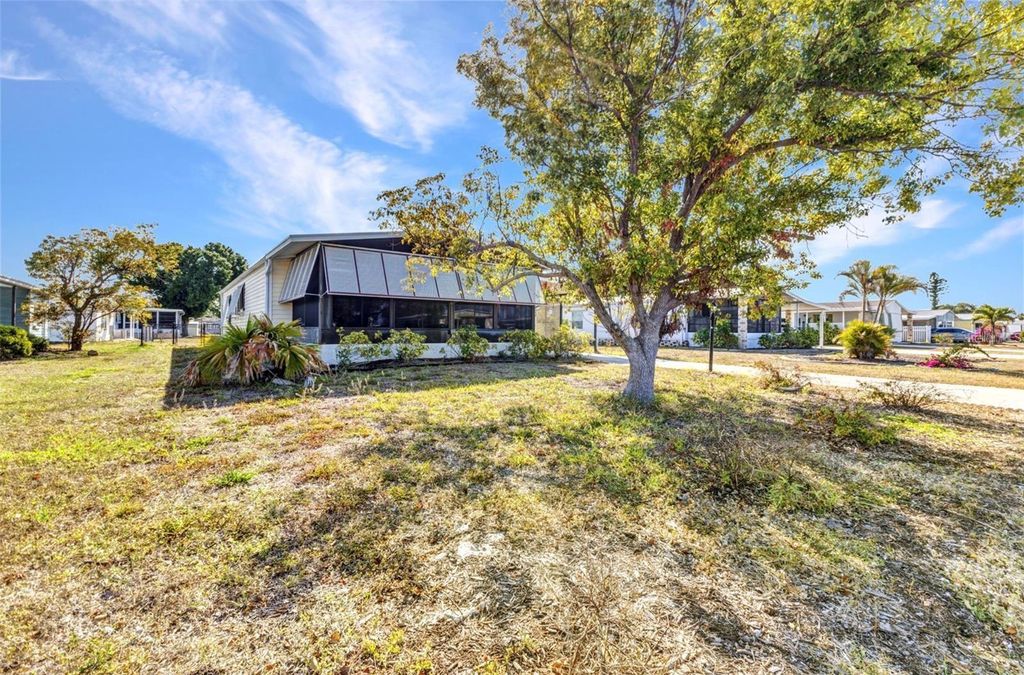 Photo of 6144 Redwing Avenue, Englewood, FL 34224 (MLS # C7514563)