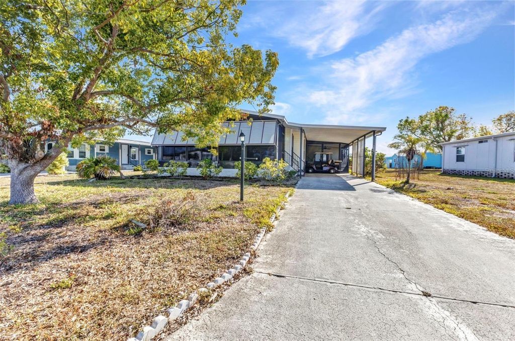 Photo of 6144 Redwing Avenue, Englewood, FL 34224 (MLS # C7514563)