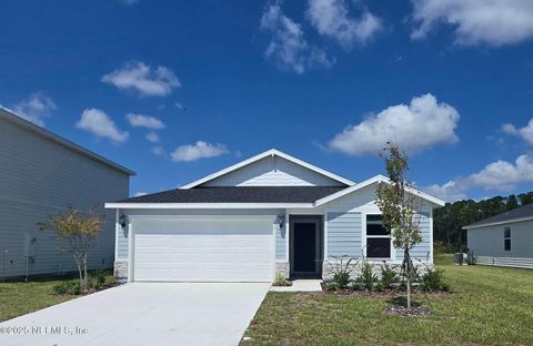 Photo of 41 Sandy Lane, Palm Coast, FL 32164 (MLS # FC312989)