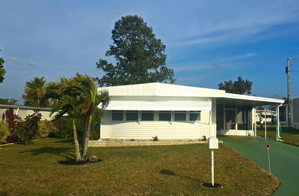 Photo of 40 Concord Lane #6, Palm Harbor, FL 34684 (MLS # TB8476911)