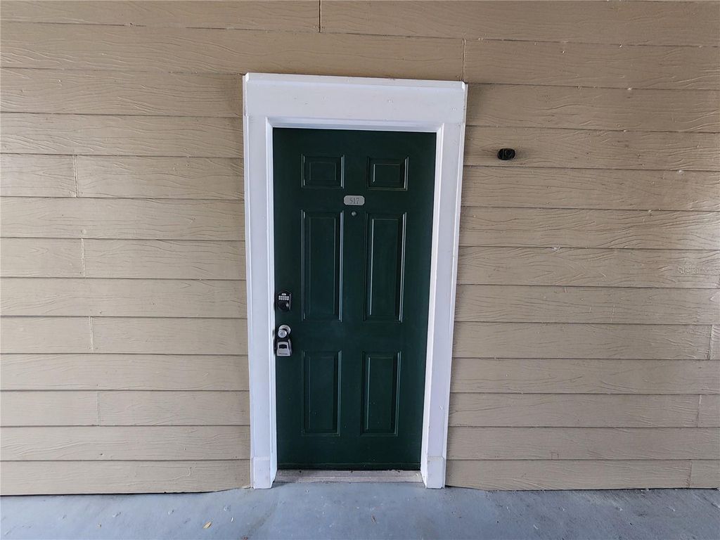 Photo of 13037 Mulberry Park Drive #517, Orlando, FL 32821 (MLS # O6381347)