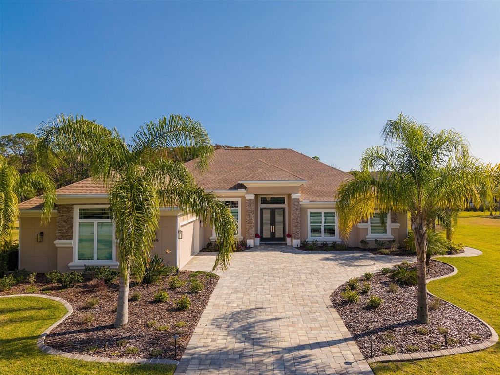 Photo of 215 Willow Oak Way, Palm Coast, FL 32137 (MLS # FC314175)