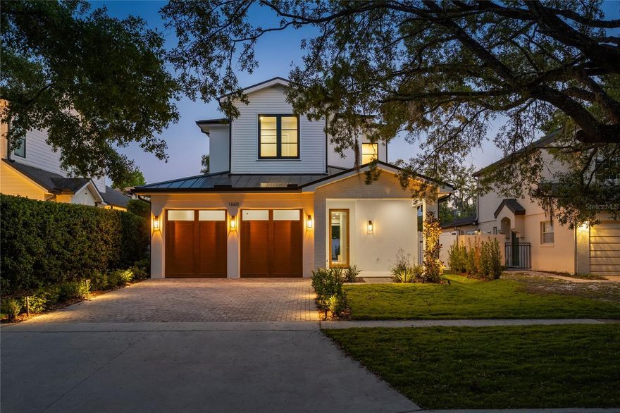 Introducing a standout new construction in Winter Park’s coveted Tree Streets!  As you arrive the home’s modern façade is complemented by a charming front porch, creating a warm yet striking introduction that feels both inviting and intentional. Inside, the home unfolds with a highly functional floor plan designed to enhance everyday living while still accommodating entertaining with ease. Clean lines, curated finishes, and natural light define the main living spaces, where the kitchen, dining, and living areas flow seamlessly together. The kitchen serves as a true focal point, featuring Calacatta Gioia quartz countertops, custom cabinetry with ample storage, a paneled refrigerator, and a full suite of Thermador appliances. The space transitions naturally into the dining area and living room, where a built-in wet bar with a wine fridge adds an elevated layer of functionality and style. The living room is designed to feel both open and connected, anchored by expansive pocketing sliders that completely open to the outdoor living area. The primary suite is thoughtfully positioned on the main level, serving as a calming retreat, featuring a spa-inspired bathroom with dual vanities, a freestanding soaking tub, and a spacious walk-in shower. Upstairs, three additional bedrooms are generously sized and well laid out, providing flexibility for guests, family, or a secondary living setup. The outdoor living experience is equally impressive, centered around a large covered lanai that offers ample space for al fresco dining and lounging. The spacious pool area is designed to complement the home’s indoor-outdoor lifestyle, creating a private setting that feels both relaxed and elevated. Beyond the home itself, the location is what truly sets this home apart. Situated in the heart of the Tree Streets, you are just a short walk to Phelps Park and the YMCA, minutes from Interlachen Country Club, and only a quick golf cart ride to the shops, dining, and energy of Park Avenue.  Homes of this caliber and location are few and far between, making this a standout opportunity in today’s market.
