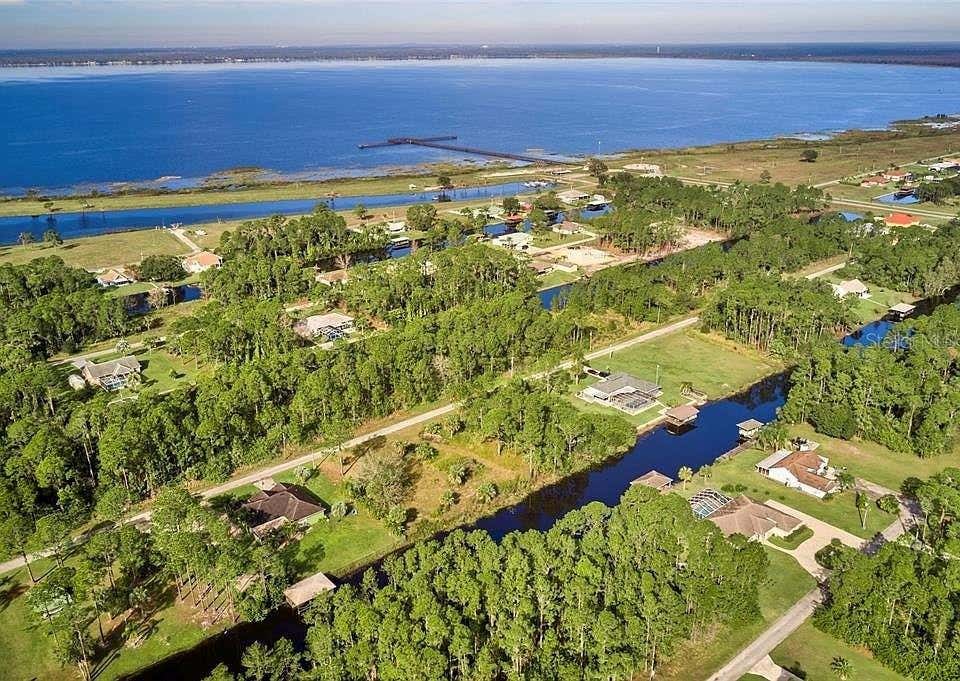 Photo of 502 Camellia Drive, Indian Lake Estates, FL 33855 (MLS # S5154162)
