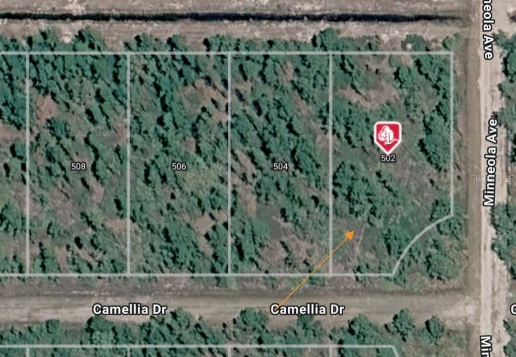 Photo of 502 Camellia Drive, Indian Lake Estates, FL 33855 (MLS # S5154162)