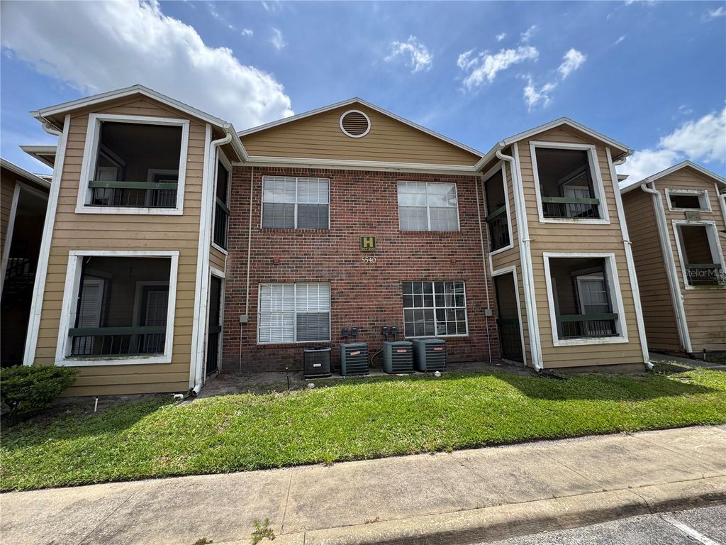 Photo of 5540 Devonbriar Way #H104, Orlando, FL 32822 (MLS # O6405981)