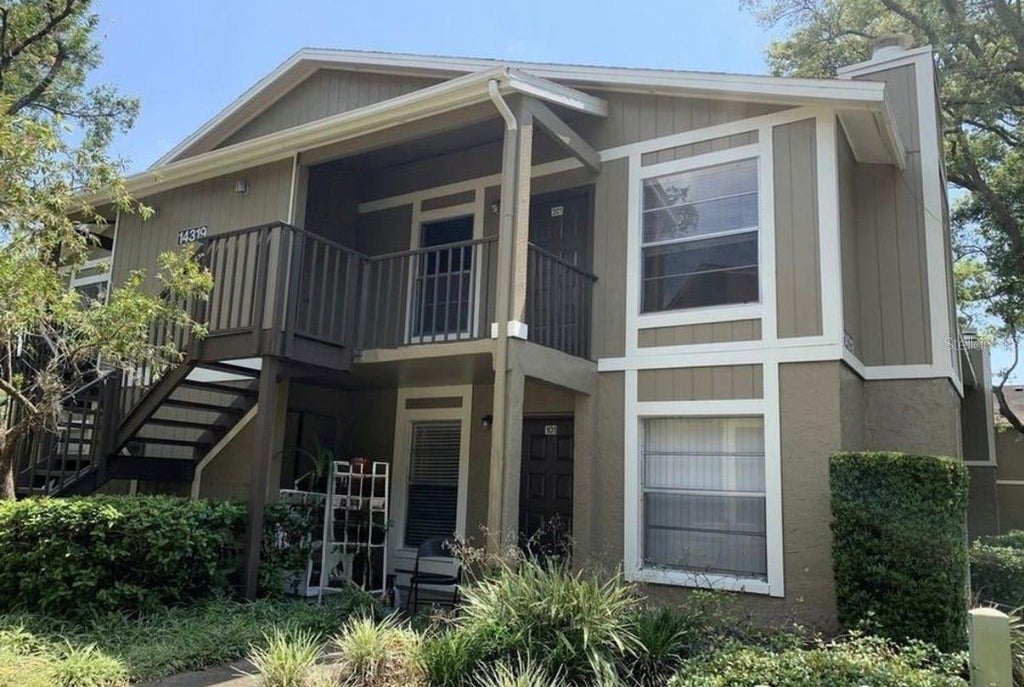 Photo of 14319 Hanging Moss Circle #201, Tampa, FL 33613 (MLS # TB8558258)
