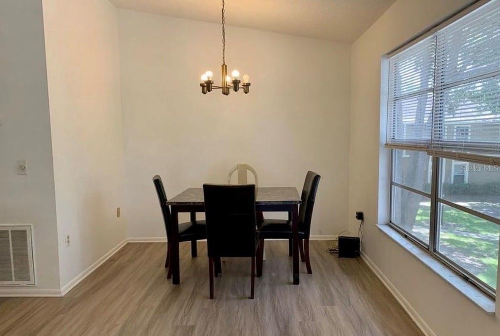 Photo of 14319 Hanging Moss Circle #201, Tampa, FL 33613 (MLS # TB8558258)