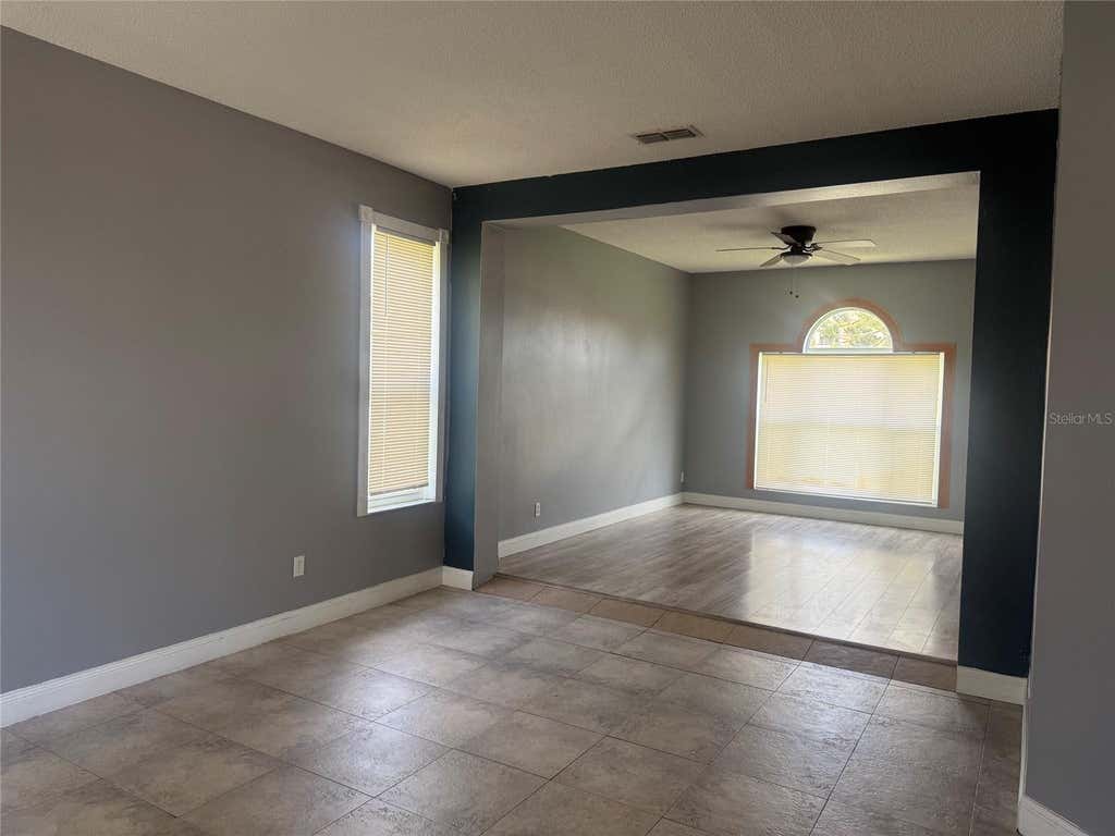 Photo of 6619 Mangrove Chase Avenue, Orlando, FL 32809 (MLS # O6434134)