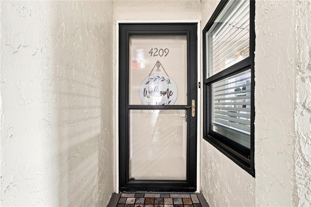 Photo of 14130 Rosemary Lane #4209, Largo, FL 33774 (MLS # TB8544436)
